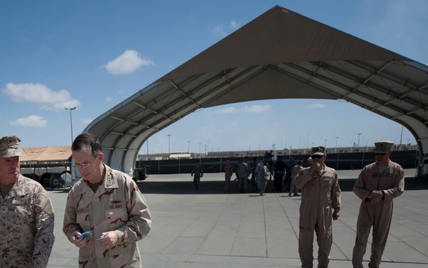 Adm. Mike Mullen speaks with Commander of Joint Task Force Horn of Africa Rear Adm. Brian L. Losey.