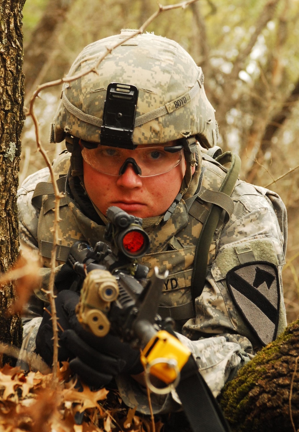 Pvt. Zach Mecthel watches for enemy movement during training at Fort Hood.