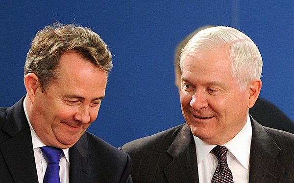 Secretary Gates speaks with British Defense Minister Liam Fox.