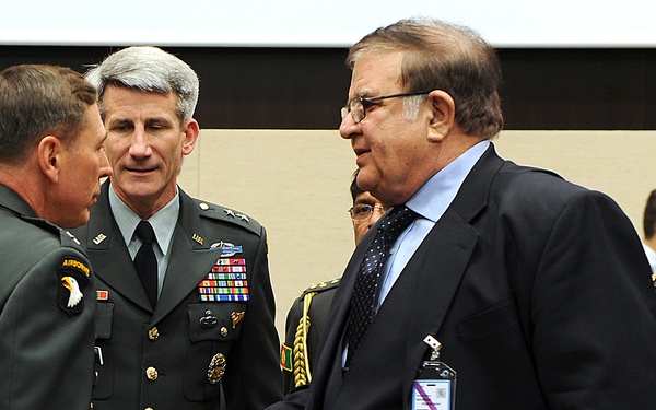 Defense Minister of Afghanistan Abdul Rahim Wardak speaks with Gen. David H. Petraeus.