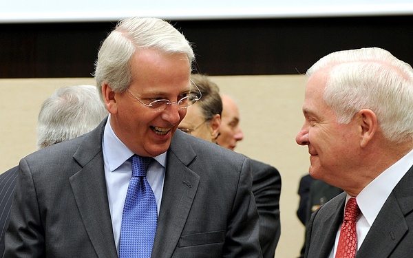 Secretary Gates speaks with U.S. Ambassador to NATO Ivan H. Daalder.