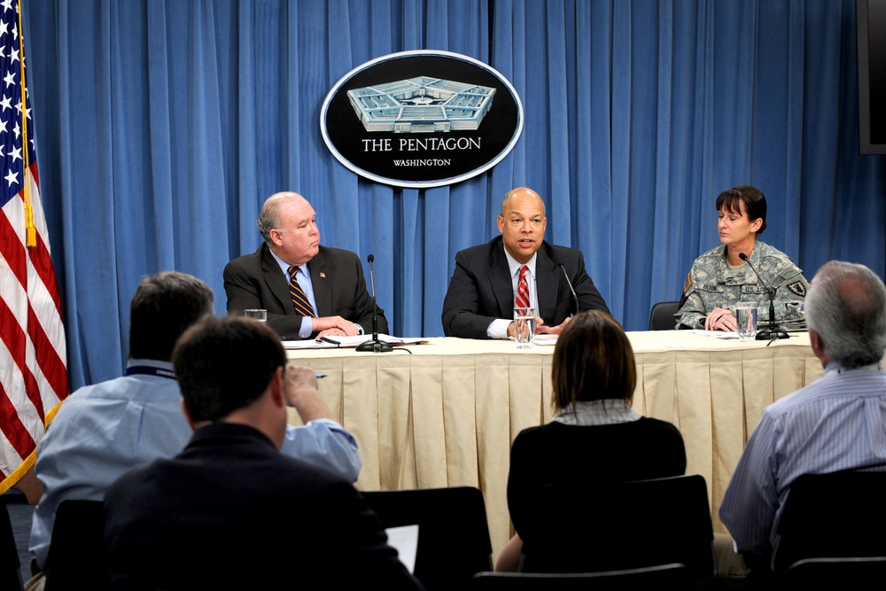 Jeh C. Johnson conducts a Pentagon press briefing.