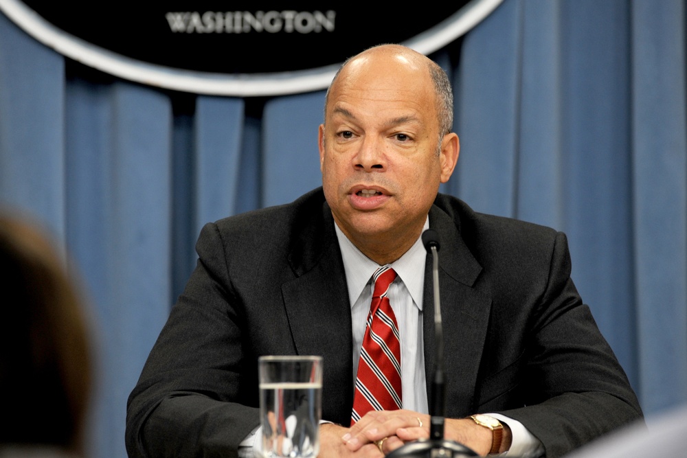 Jeh Johnson conducts a Pentagon press briefing.