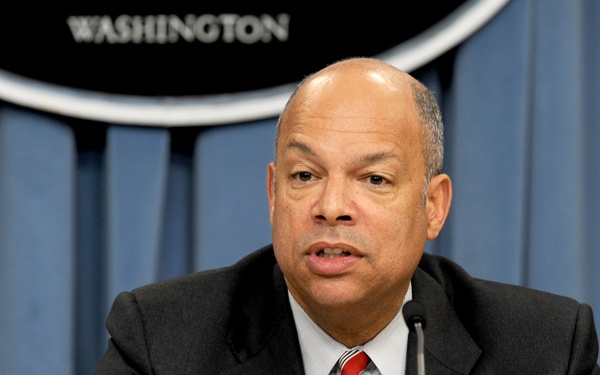 Jeh Johnson conducts a Pentagon press briefing.