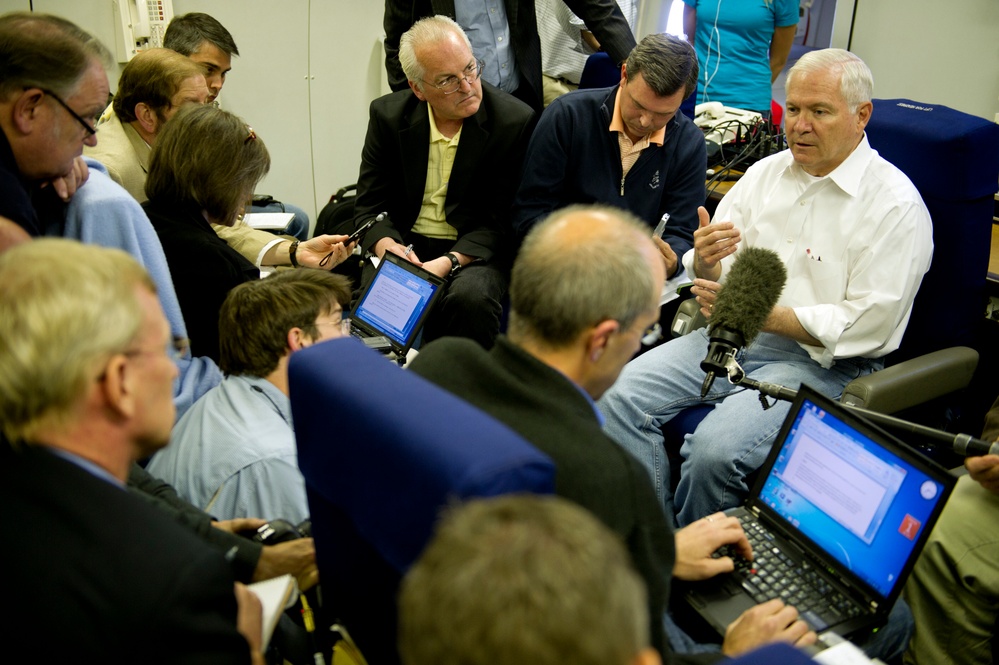 Secretary Gates speaks with members of the press.