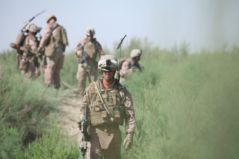 Sgt. Charles Hayes leads a patrol near Combat Outpost Castle.