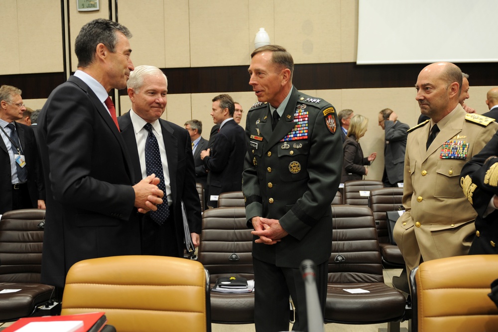 NATO Secretary General Anders Fogh Rasmussen, Secretary Gates, ISAF Commander Gen. David Petraeus and Supreme Allied Commander Europe speak just prior to a NATO meeting.