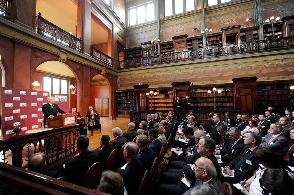 Secretary Gates addresses the audience during a Security and Defense Agenda event.