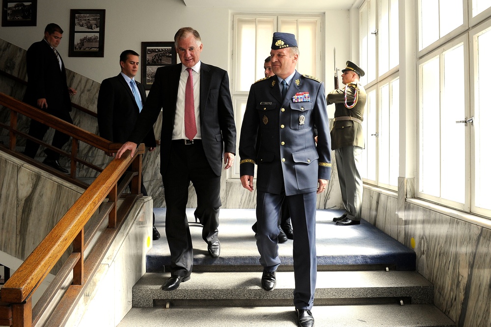 Deputy Secretary Lynn is escorted to his motorcade by Czech Republic Chief of the General Staff Gen. Vlastimil Picek.