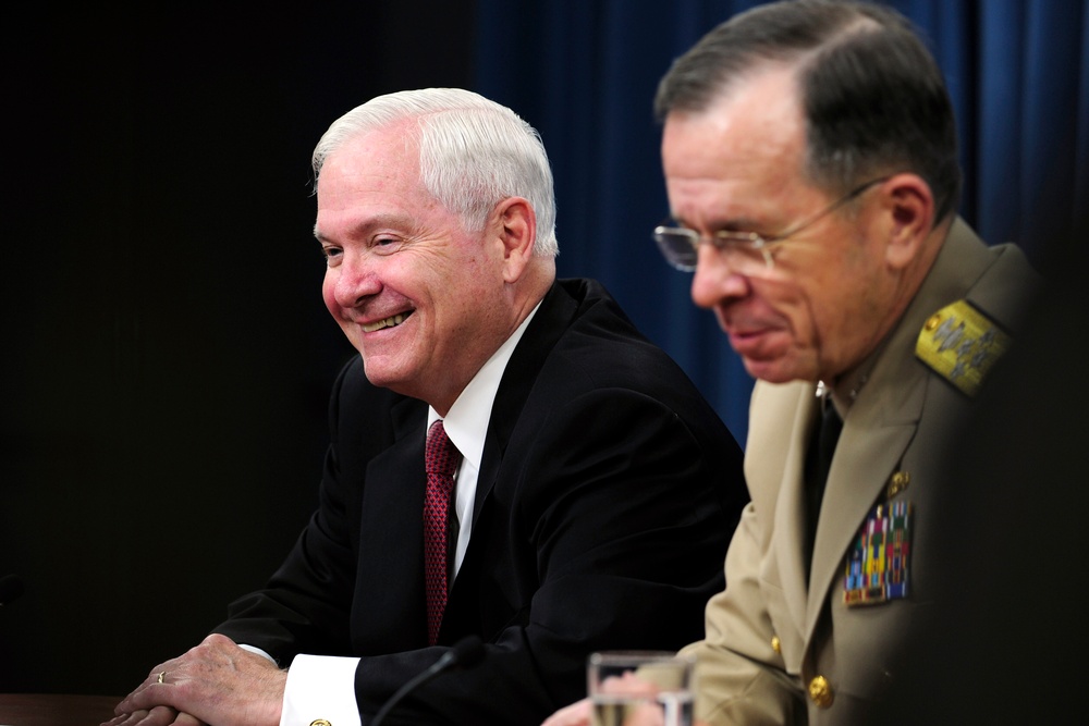 Secretary Gates and Adm. Mike Mullen conduct a press conference.