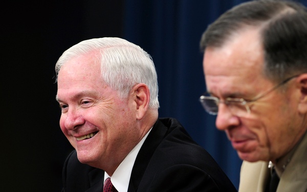 Secretary Gates and Adm. Mike Mullen conduct a press conference.