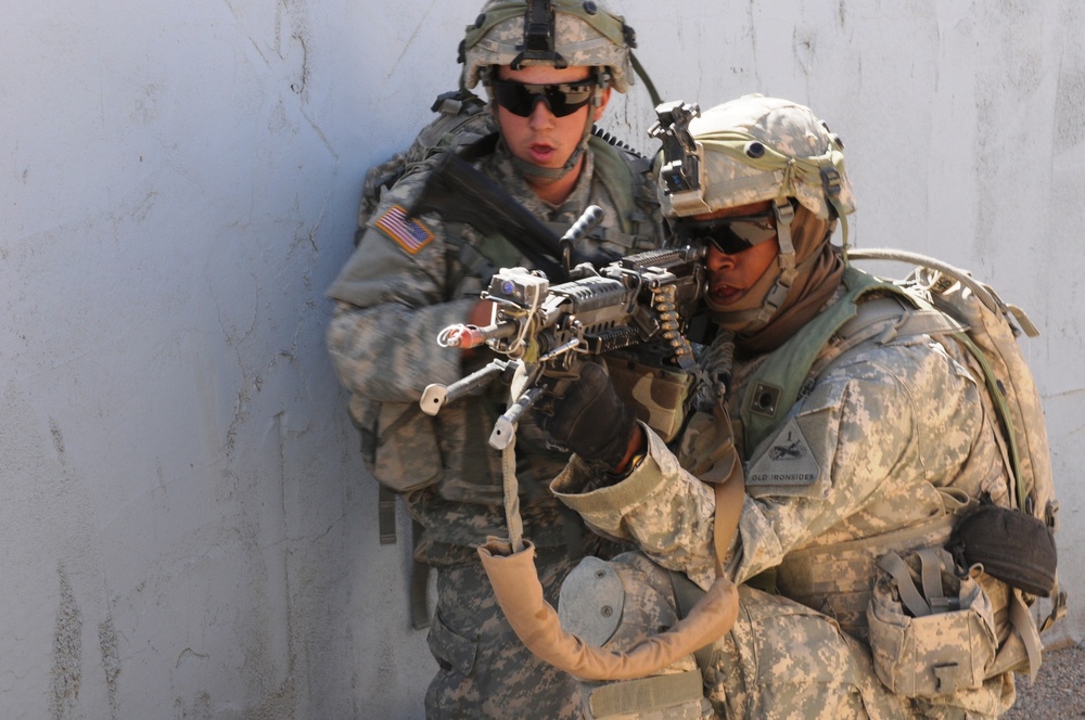 U.S. Army soldiers fire at the enemy as part of a training mission.