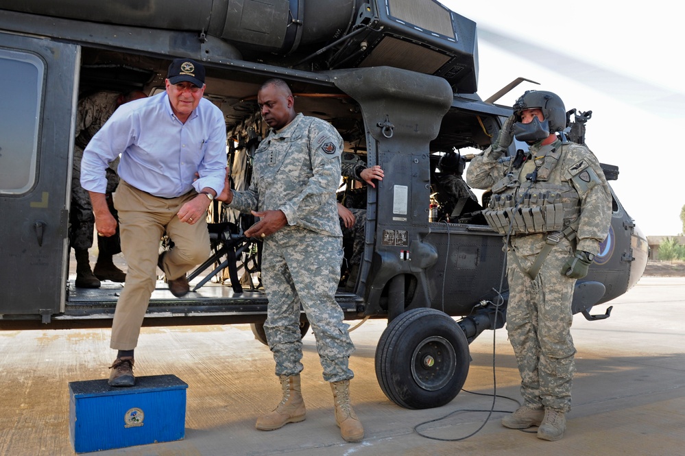 Secretary Panetta steps off a UH-60 Blackhawk helicopter at Camp Victory.