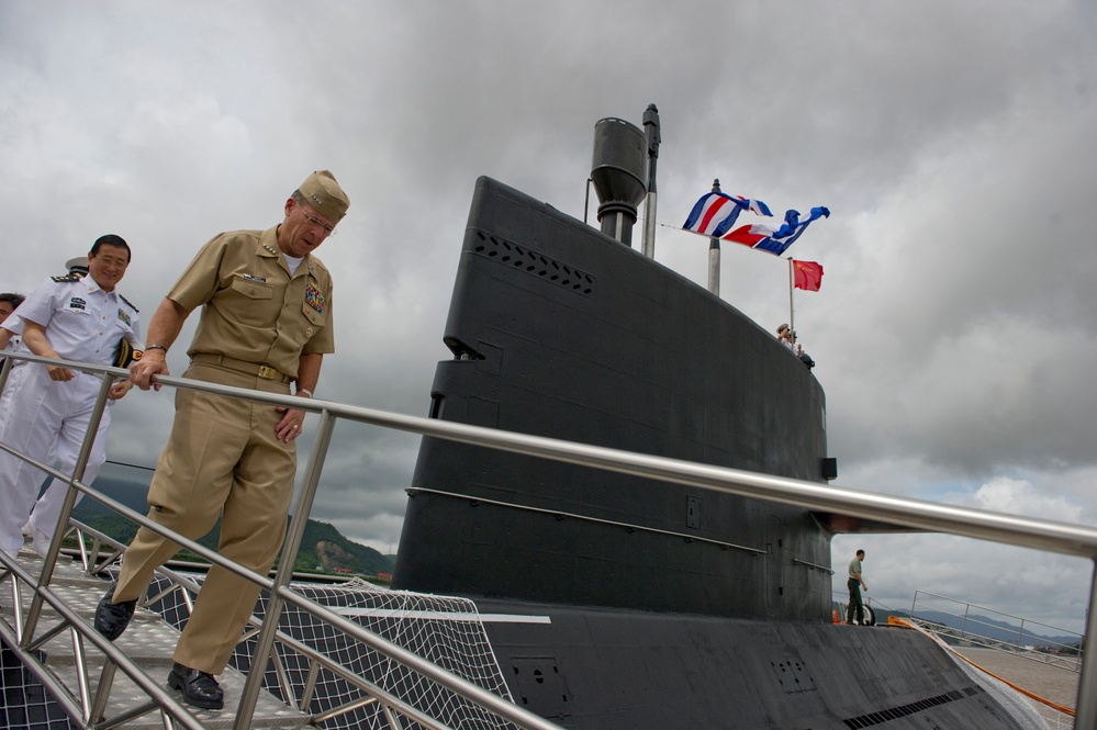 Adm. Mike Mullen departs the Chinese People's Liberation Army-Navy submarine Yuan.