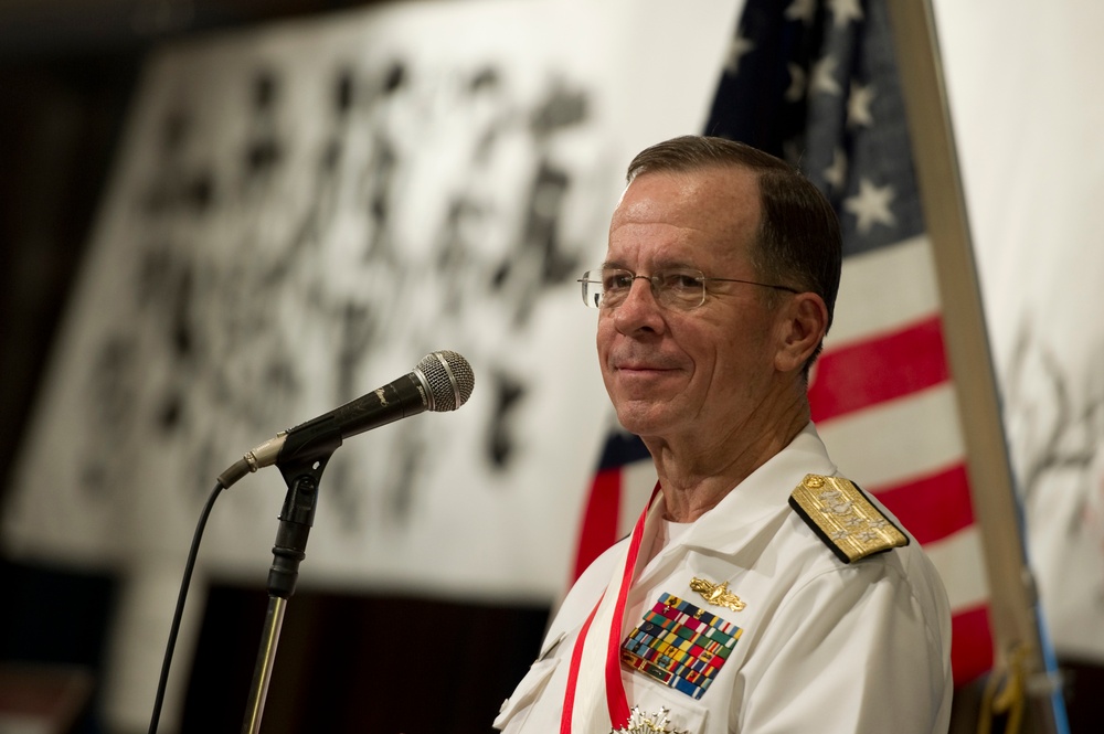 Adm. Mike Mullen addresses attendees at a reception honoring his visit to Tokyo.