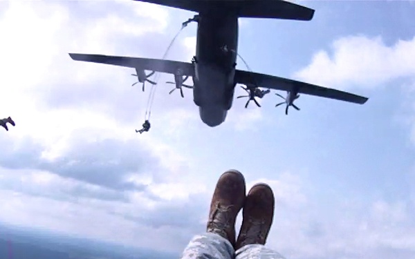 Staff Sgt. Travis Surber parachutes out of a C-130 Hercules aircraft in Ukraine.