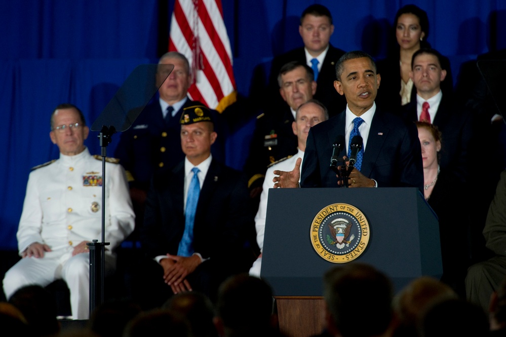 President Barack Obama addresses audience members at the Washington Navy Yard.