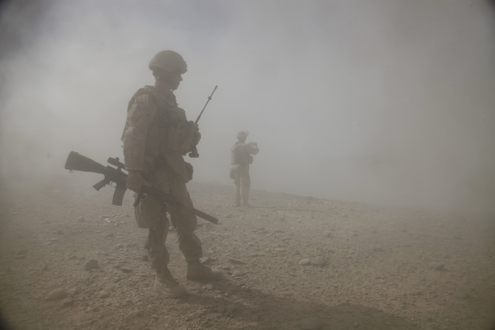 Sgt. Calvin Nash waits for the dust to clear
