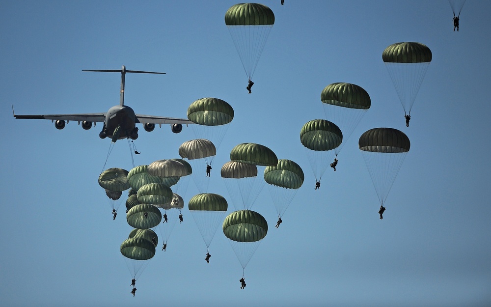 U.S. Army paratroopers from the 82nd Airborne Division descend to the ground