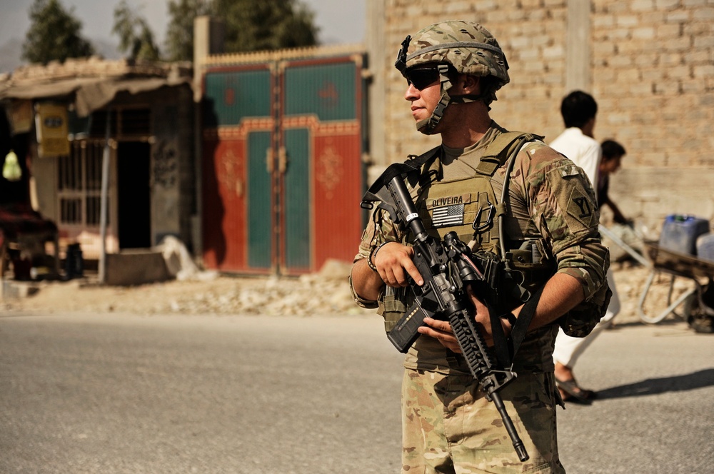 Spc. Alexander Oliveira provides security at an intersection