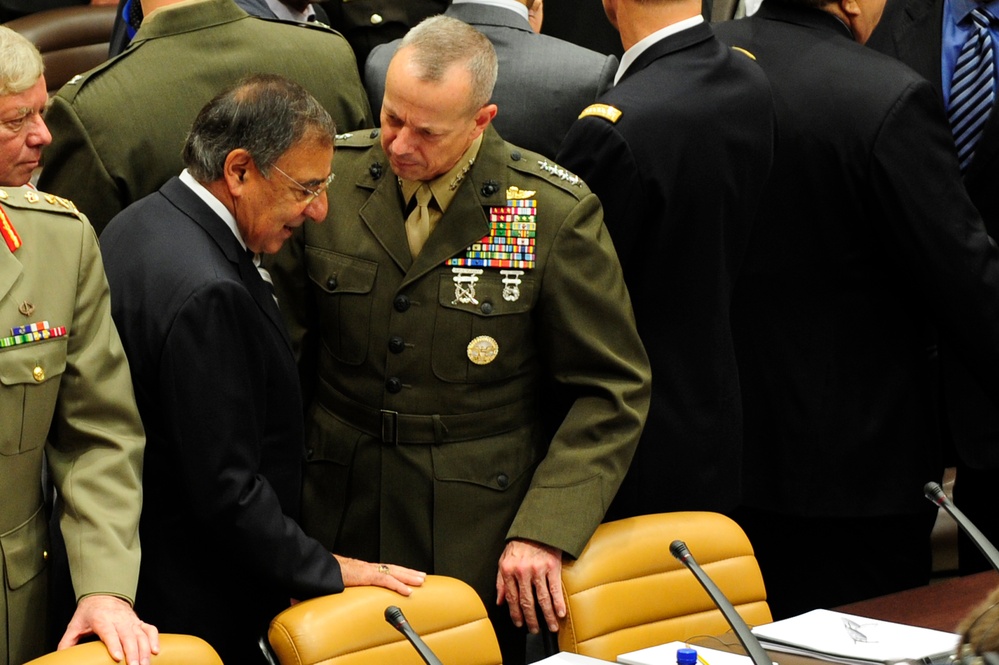 Secretary Panetta talks with Gen. John Allen