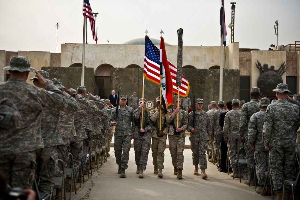 The colors are retired during a ceremony marking the end of the U.S. mission in Iraq.