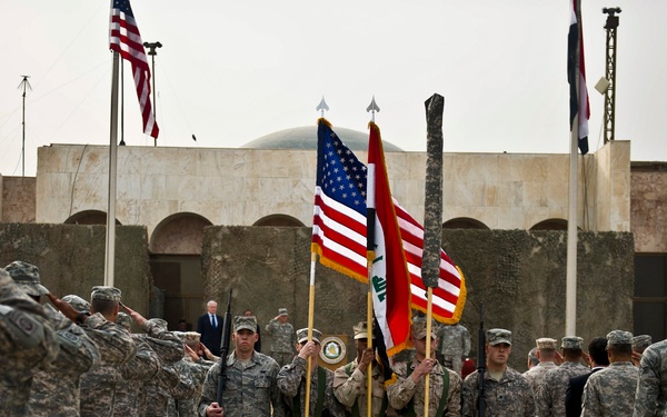 The colors are retired during a ceremony marking the end of the U.S. mission in Iraq.