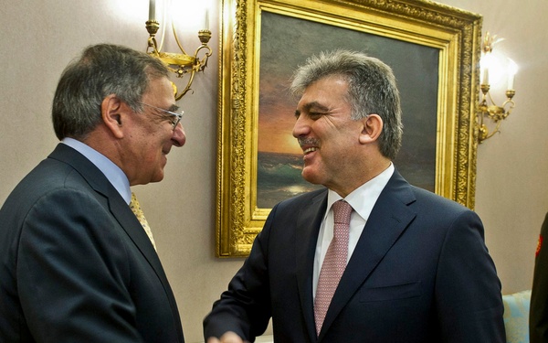 Secretary Panetta shakes hands with Turkish President Abdullah Gul.