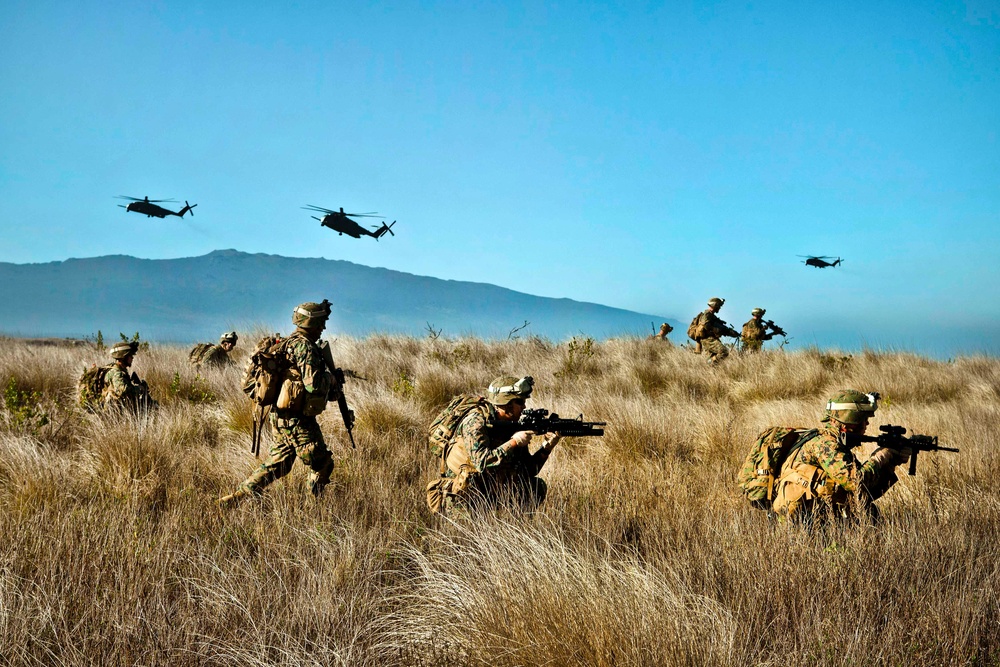 U.S. Marines conduct immediate-action drills after a helicopter insert.