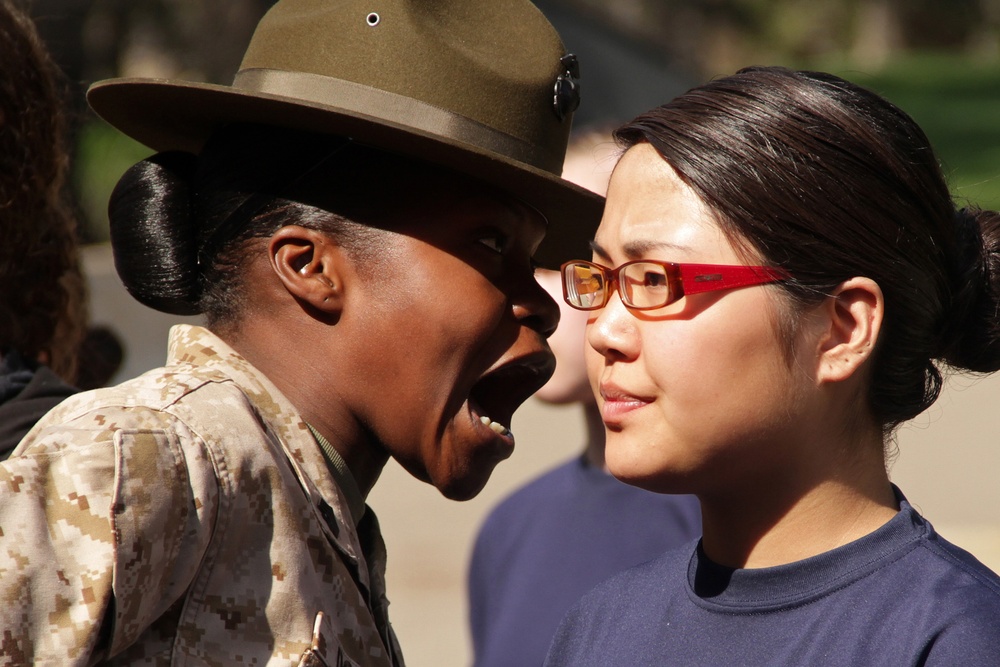 Sgt. Marline Dominic explains to Rachel Murray the importance of sounding off during a pool function.