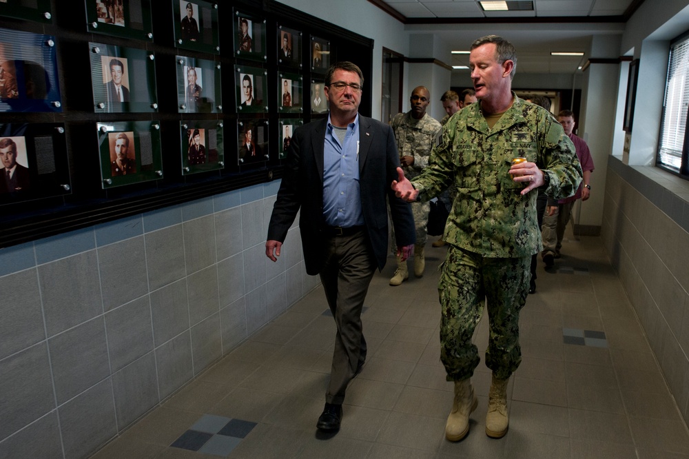Adm. William H. McCraven escorts Deputy Secretary Carter through the corridors of Special Operations headquarters.