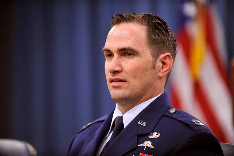Capt. Barry F. Crawford Jr. responds to questions during a press briefing in the Pentagon.