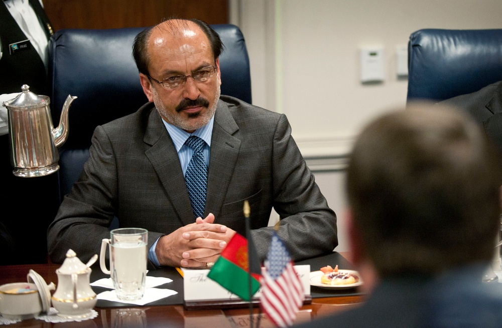 First Deputy Minister of Defense for Afghanistan Enayatullah Nazari listens to the opening remarks by Deputy Secretary Carter