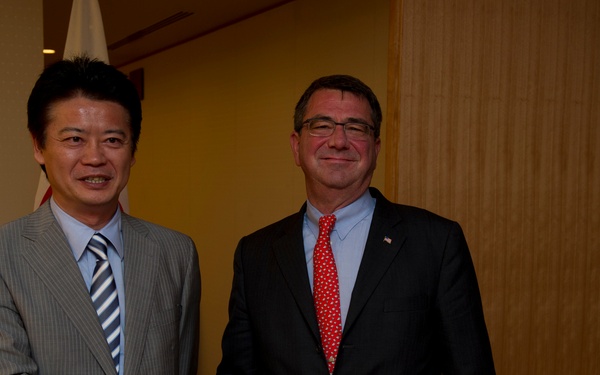 Deputy Secretary Carter and Japanese Foreign Minister Koichiro Gemba pose for photographers
