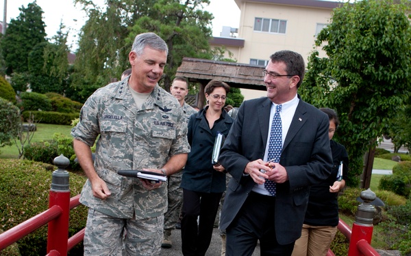 Deputy Secretary Carter walks with Air Force Lt. Gen. Sam Angelella