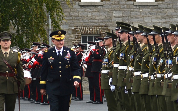 Chairman of the Joint Chiefs of Staff Gen. Martin E. Dempsey reviews the Irish Honor Guard