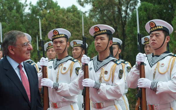 Secretary Panetta reviews a formation of Chinese sailors in Qingdao, China.