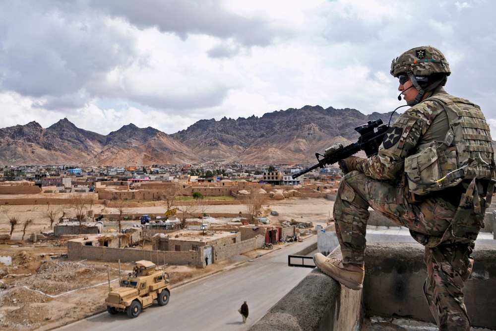U.S. Army 1st Lt. Robert Wolfe provides rooftop security