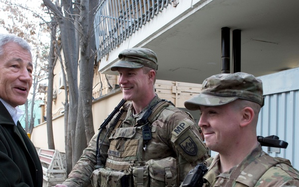 Secretary Hagel shakes hands with U.S. Army military policemen