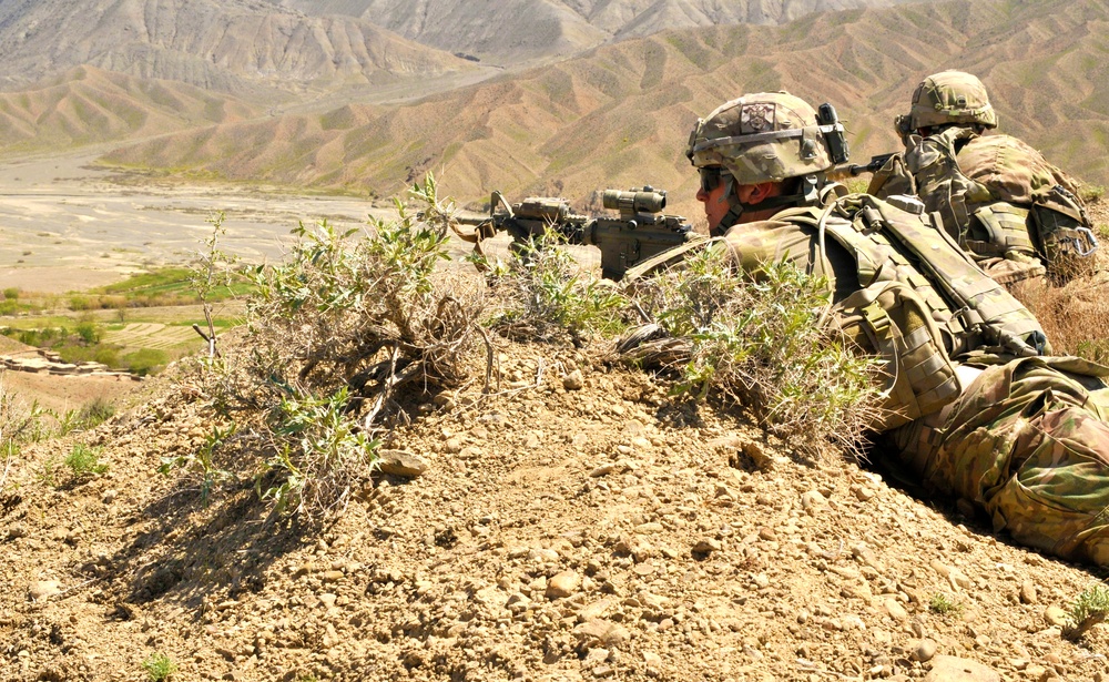 U.S. Army Sgt. David J. Reilly and soldiers with 2nd Battalion, 23rd Infantry Regiment, provide security
