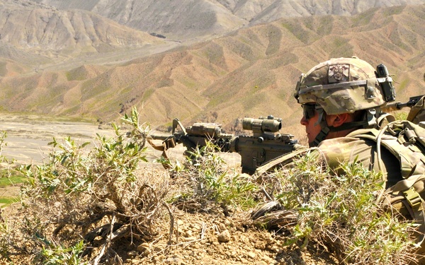 U.S. Army Sgt. David J. Reilly and soldiers with 2nd Battalion, 23rd Infantry Regiment, provide security