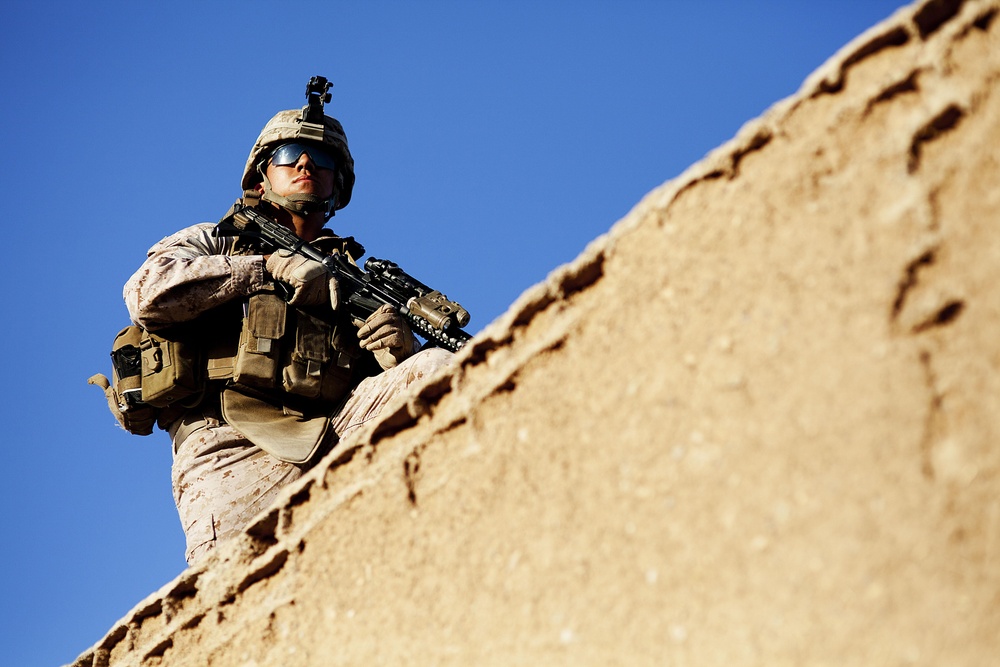 U.S. Marine Corps Lance Cpl. Pablo Perez provides security