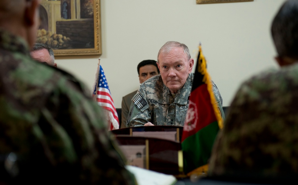 Gen. Dempsey listens to Chief of the General Staff of the Afghan Army Gen. Sher Mohammad Karimi