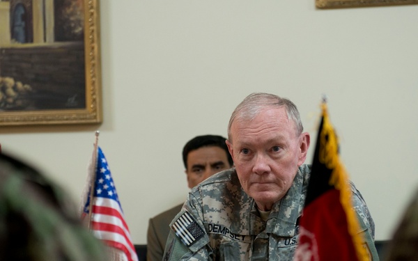 Gen. Dempsey listens to Chief of the General Staff of the Afghan Army Gen. Sher Mohammad Karimi