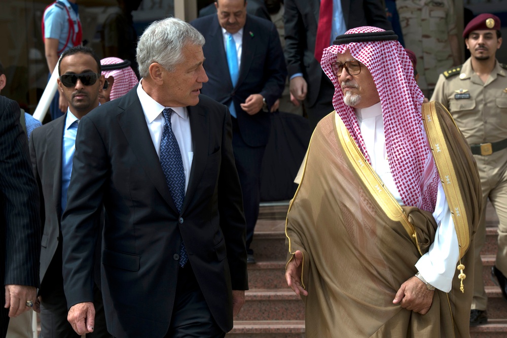 Secretary Hagel walks with Saudi Deputy Minister of Defense Prince Fahd bin Abdullah before departing Riyadh