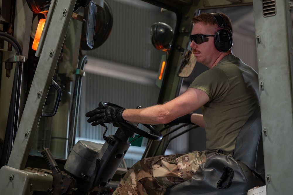 AMC Airmen palletize cargo on a KC-46 during Talisman Sabre 25