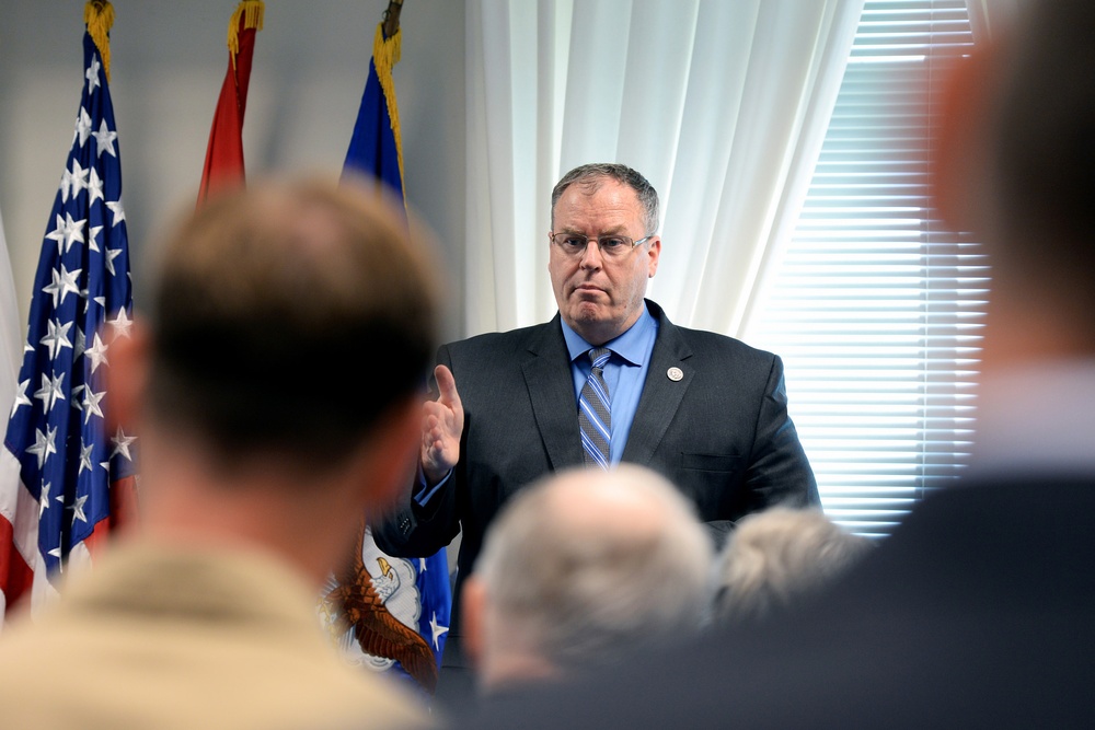 Work Speaks at Military Pay Commission Ceremony