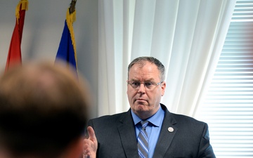 Work Speaks at Military Pay Commission Ceremony