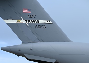 Training in Motion: 734th AMS conducts C-17 engine running offload