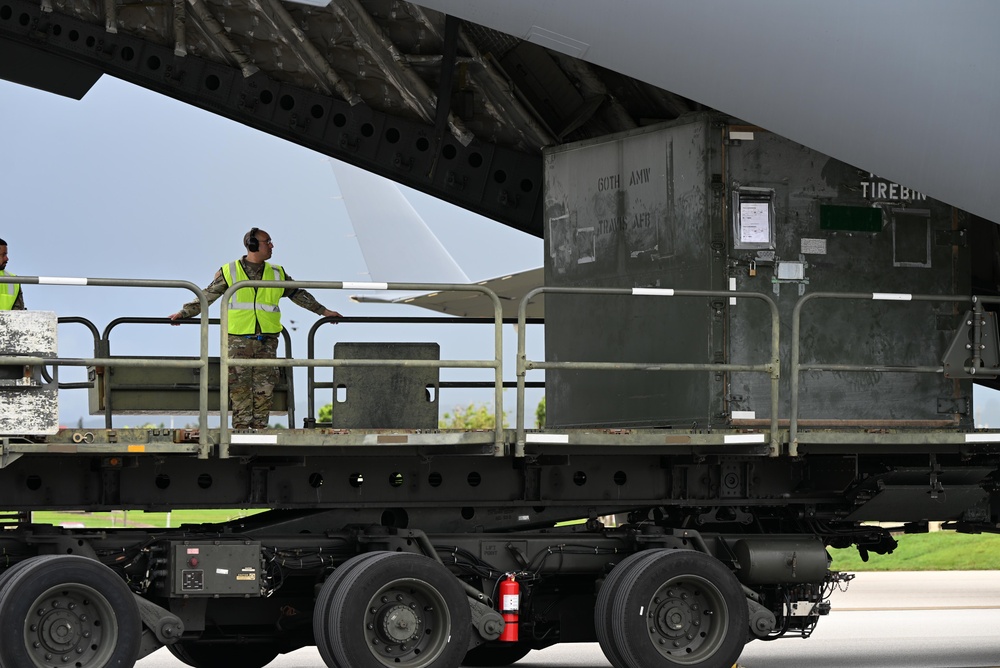 Training in Motion: 734th AMS conducts C-17 engine running offload